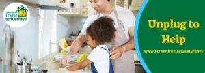 Child and adult washing dishes together, smiling.