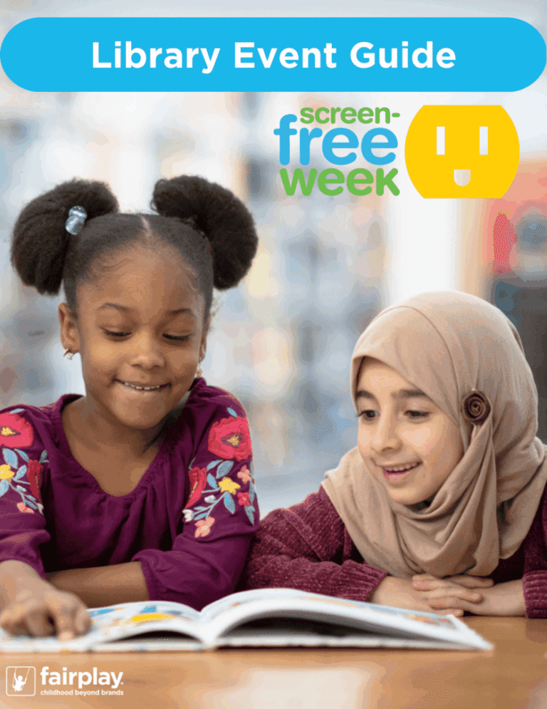 Two girls happily reading together during Screen-Free Week.